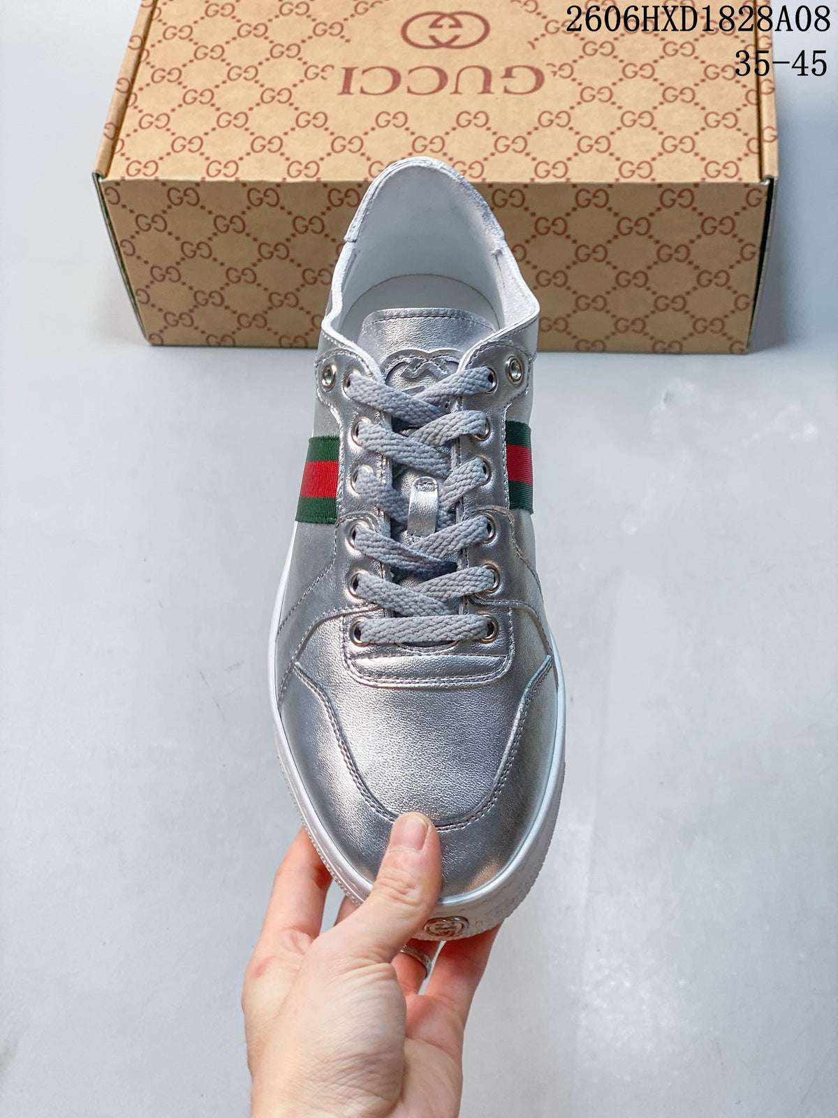 Gucci Silver Low-Top Sneakers with Green-Red Web Stripe