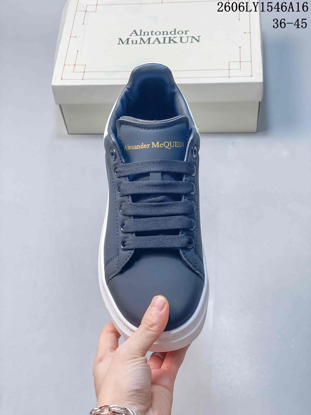 Alexander McQueen Low-Top Sneakers in Navy and White