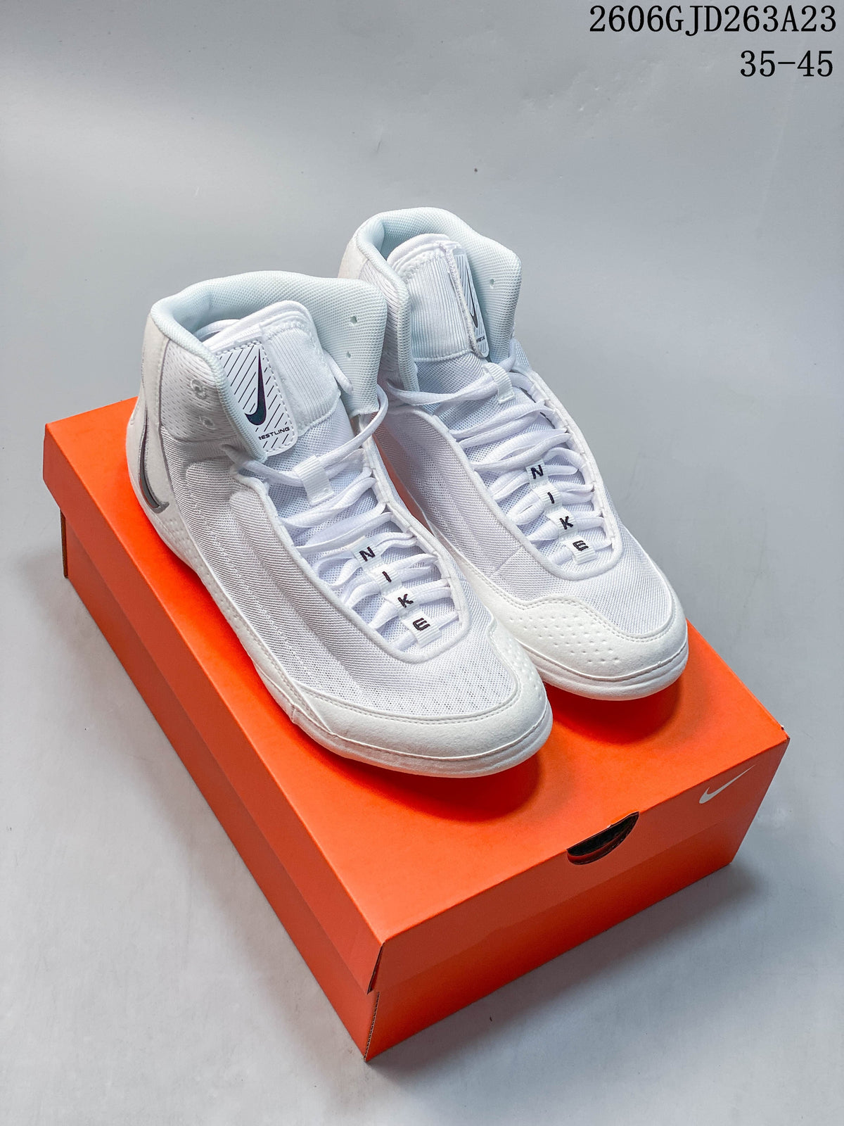 Nike Inflict 4 Wrestling Shoes in White and Grey