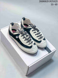 Chanel Two-Tone Low-Top Trainer in Black and Ivory