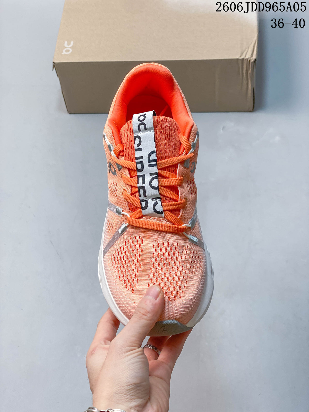 On Cloudsurfer Trail Running Shoes in Coral