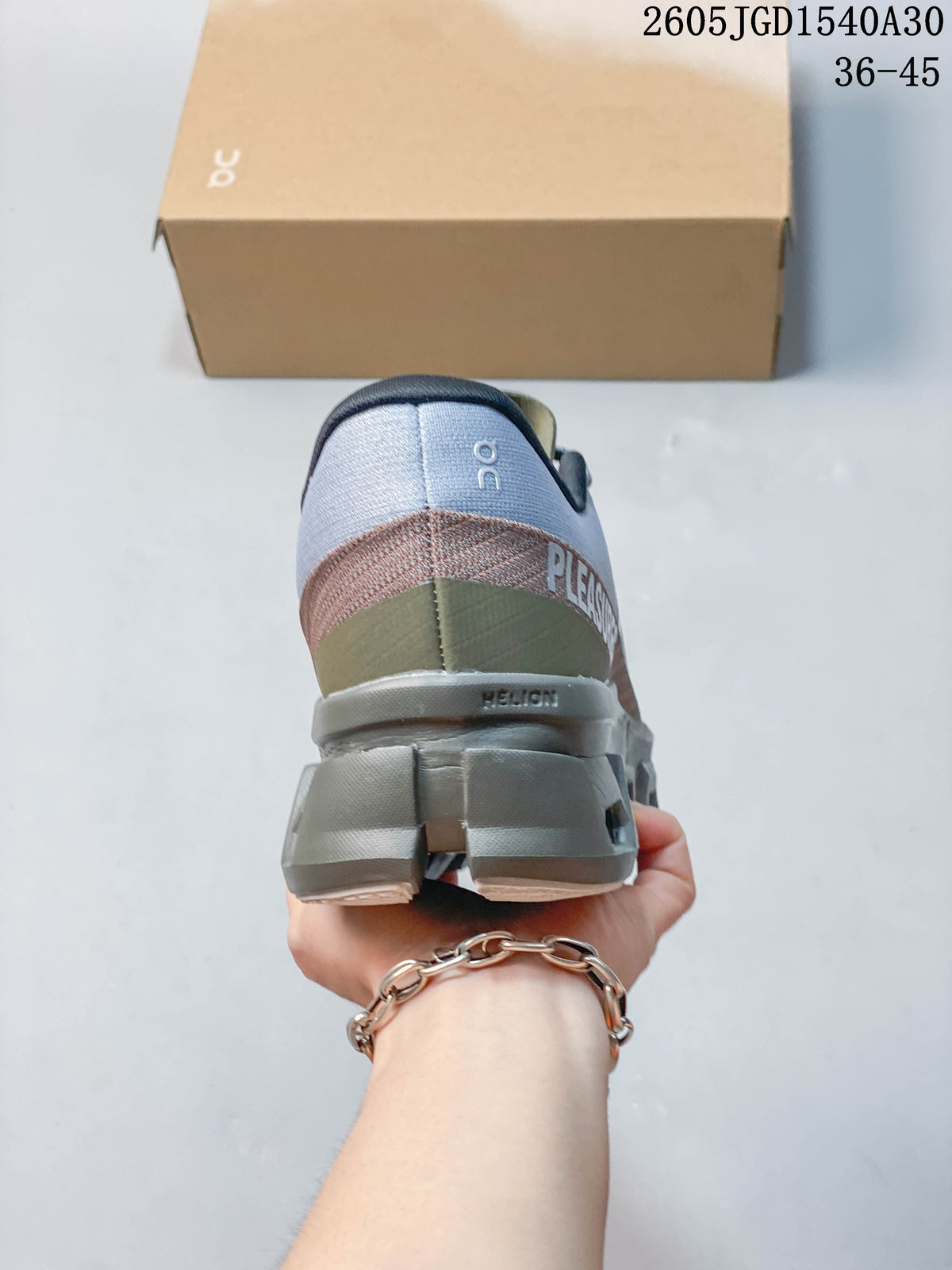 On Cloudmonster Void Low-Top Sneakers in Gray