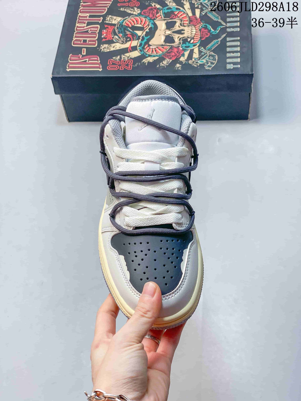 Jordan Air Jordan 1 Low Strap Sneakers in Gray and White