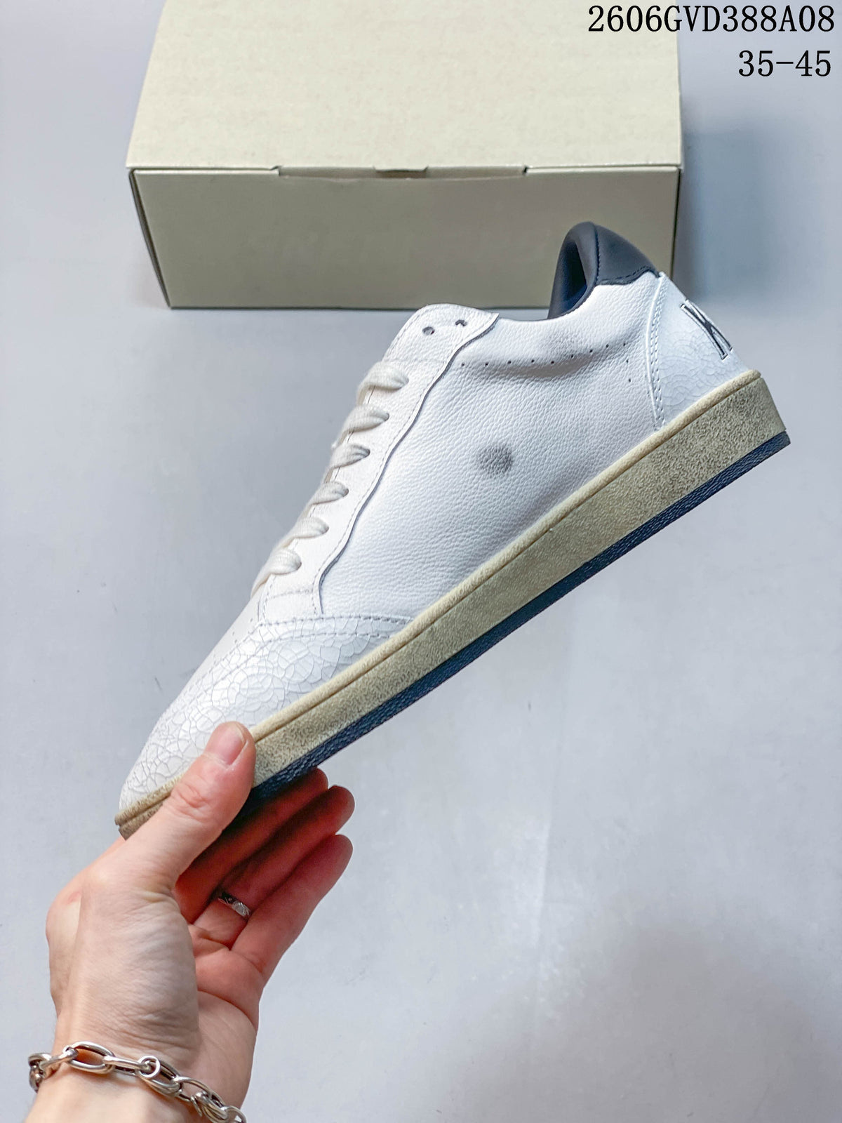 Golden Goose Super-Star White and Navy Star Sneakers 2606GVD388A08
