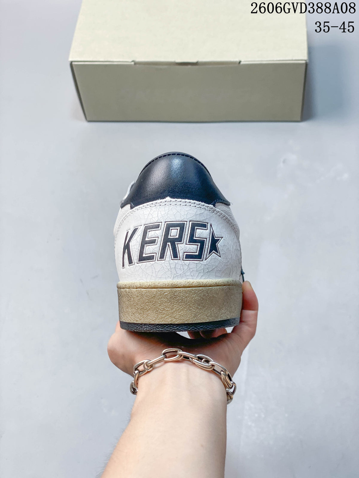 Golden Goose Super-Star White and Navy Star Sneakers 2606GVD388A08