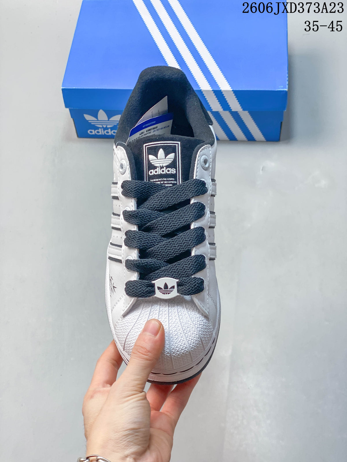 Adidas Originals Superstar White and Black Sneakers JXD373A23