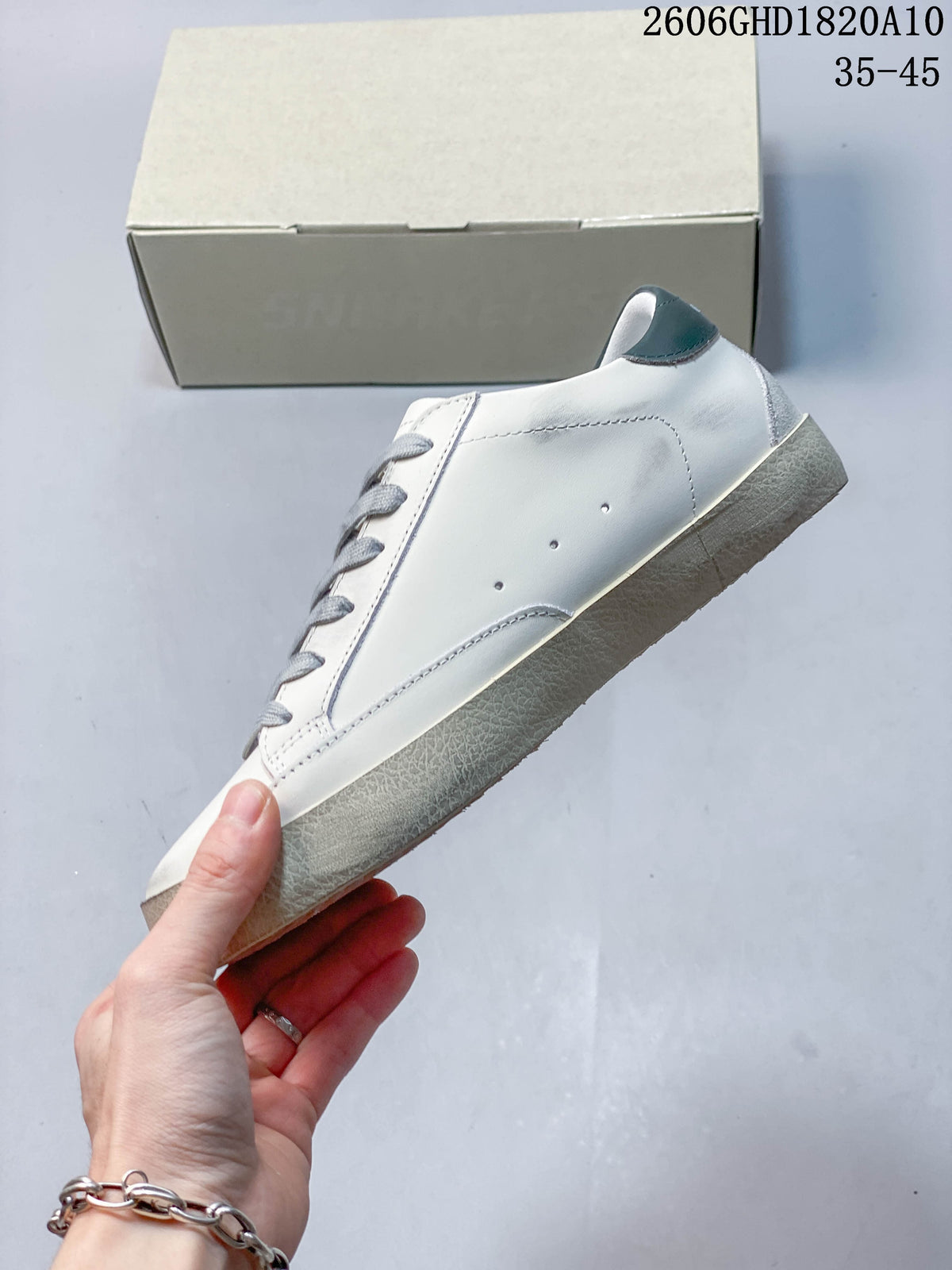 Golden Goose Super-Star Sneakers in White with Red Star