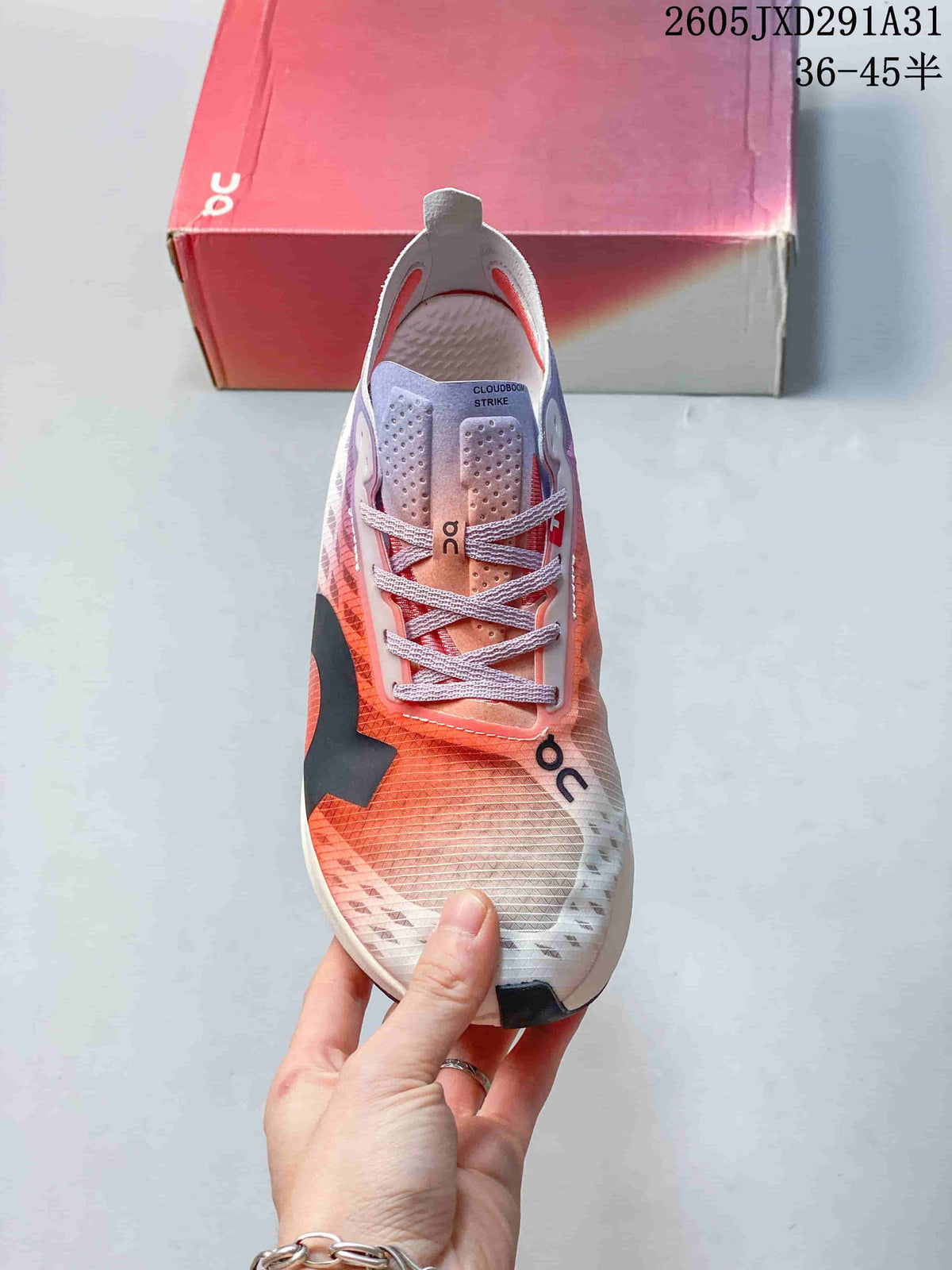 On Cloudboom Strike Running Shoes in Coral and Lilac