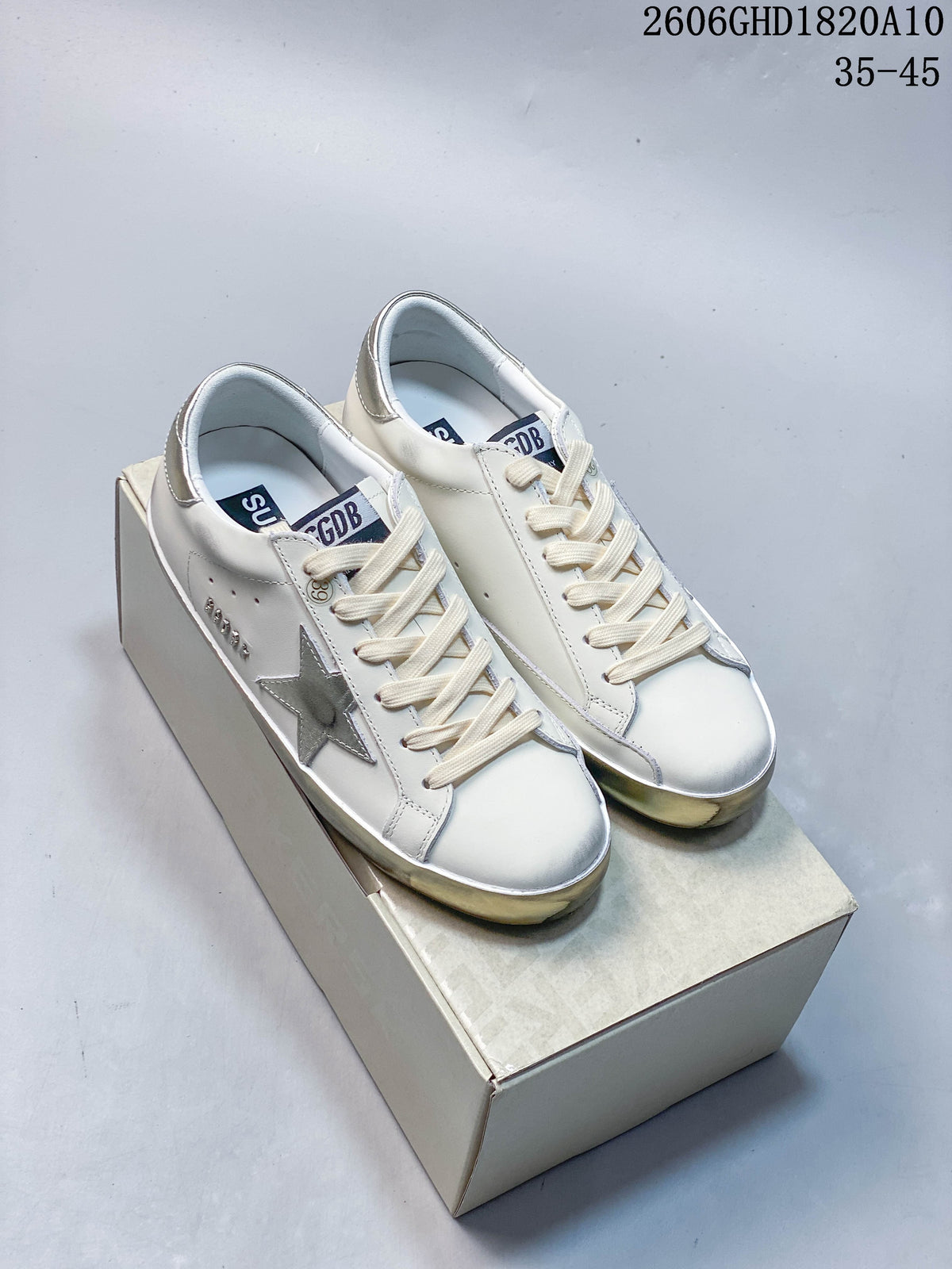 Golden Goose Super-Star White Sneakers with Silver Star