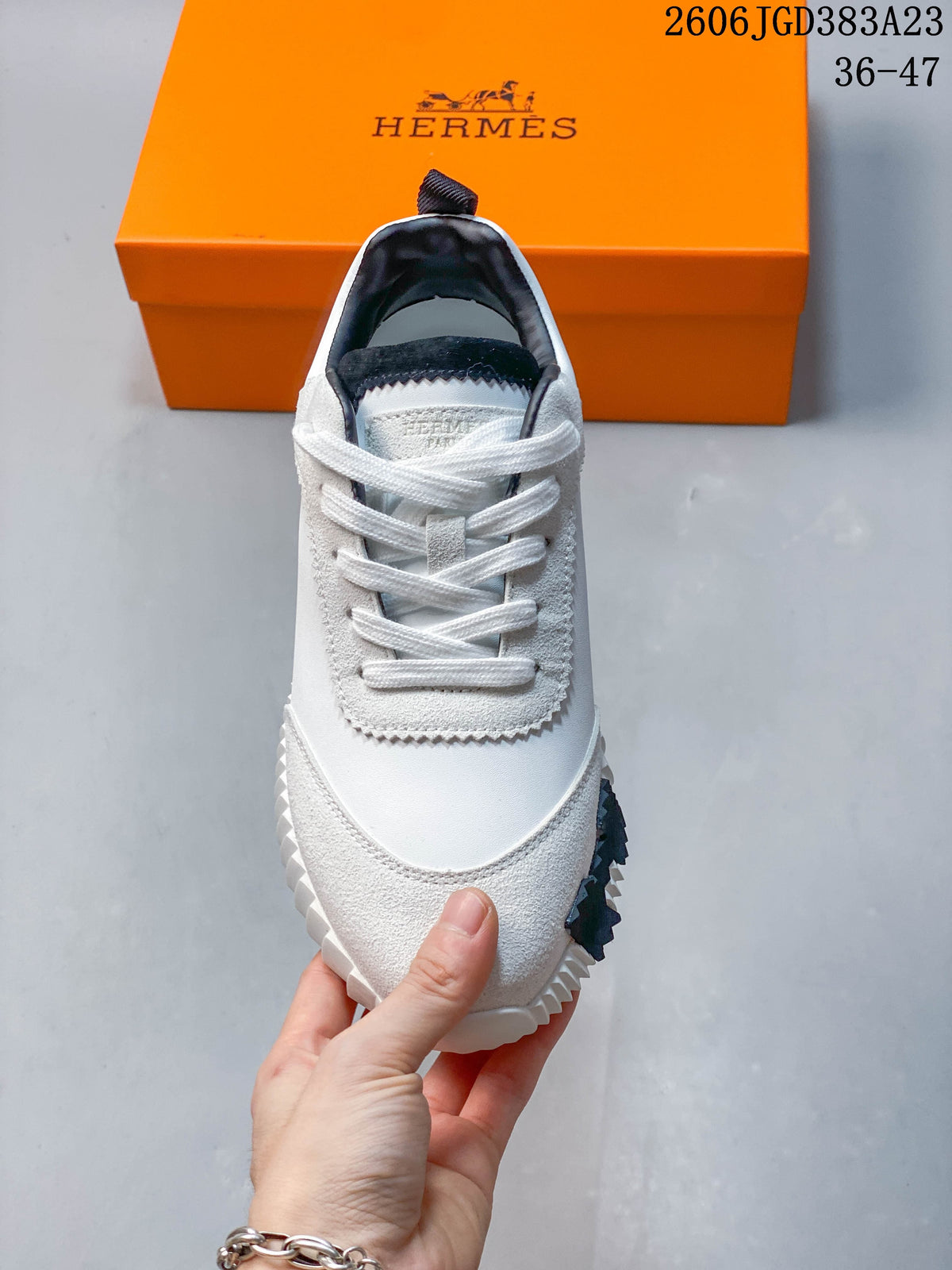Hermès Low-Top Sneakers in White and Black