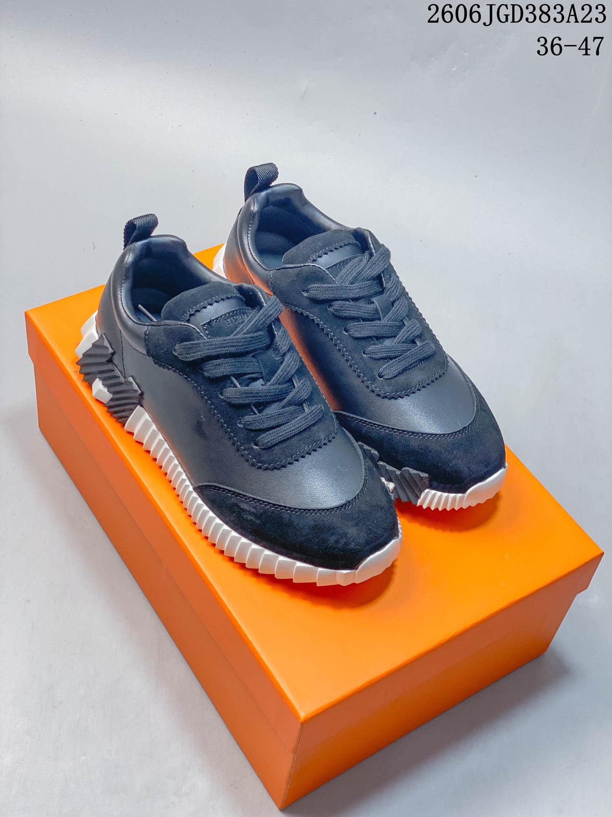 Hermès Low-Top Sneakers in Navy and White