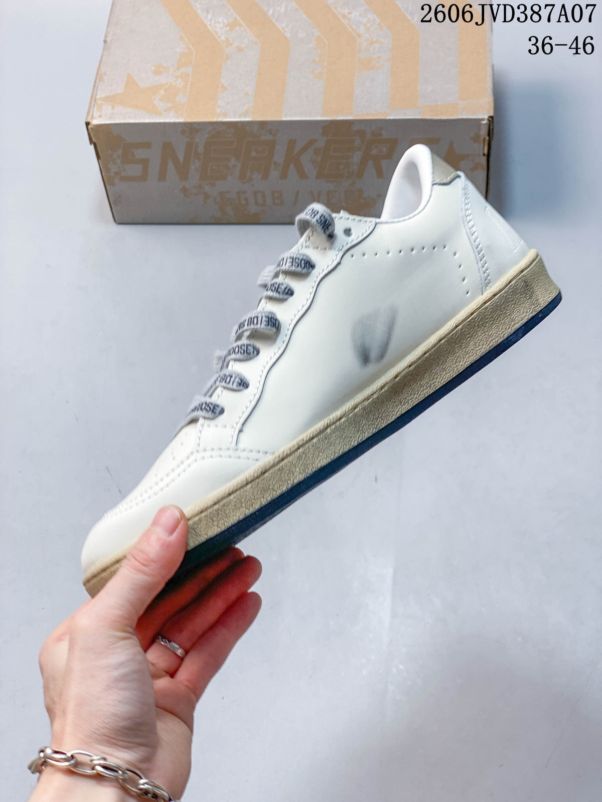 Golden Goose Super-Star Low-Top Sneakers in White and Silver