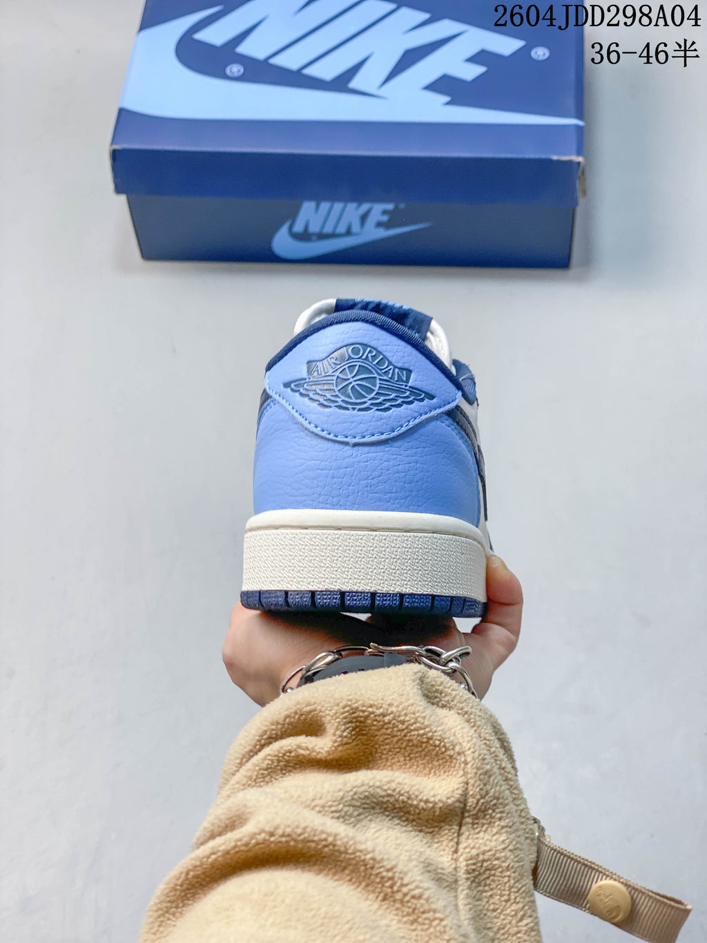 Jordan AJ1 Low Blue and White Sneakers